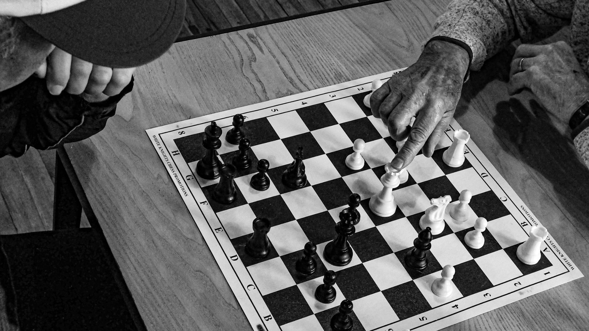 Players enjoying Sunday chess at a local venue